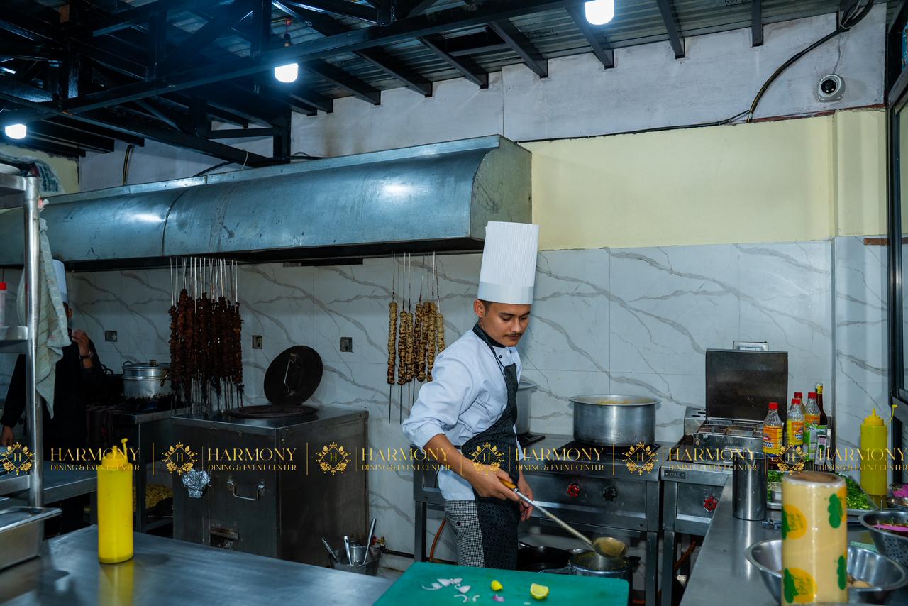 Kitchen preparation and teamwork at Harmony